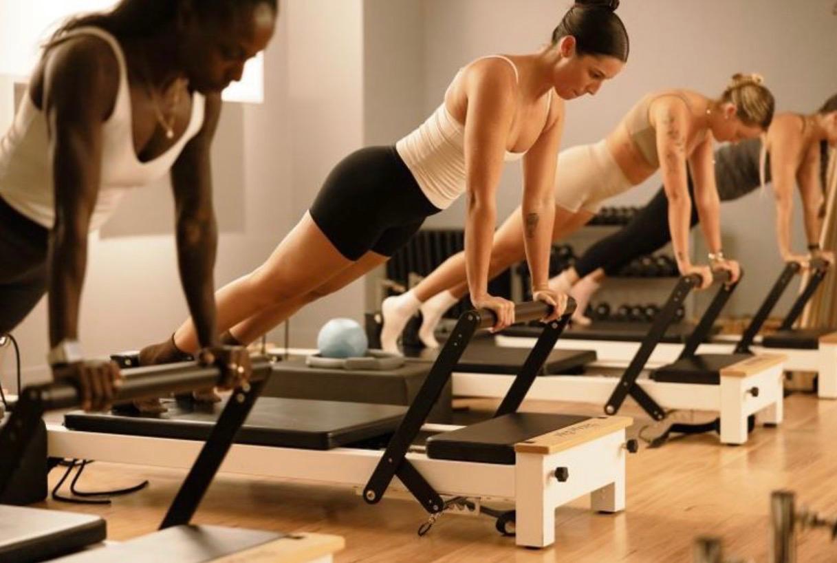 Reformer Pilates class in session